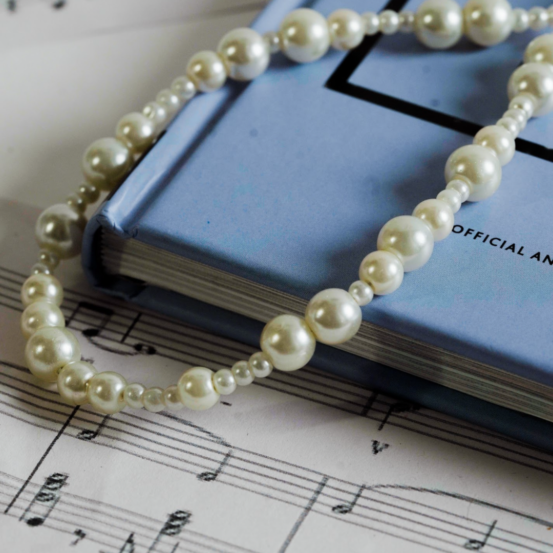 Ivory Glow Phone Charm