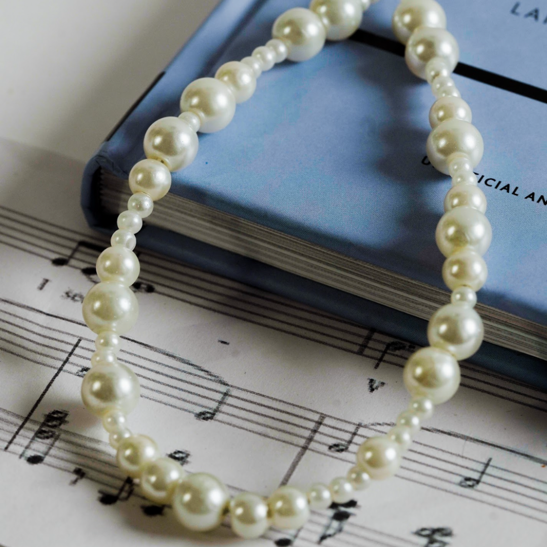Ivory Glow Phone Charm